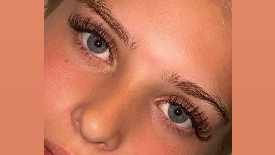 Close-up of elegant eyelash extensions from Lashes By Lucie in Watford, England, GB, showcasing detailed lash work.