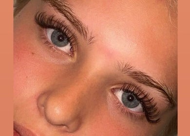 Close-up of elegant eyelash extensions from Lashes By Lucie in Watford, England, GB, showcasing detailed lash work.
