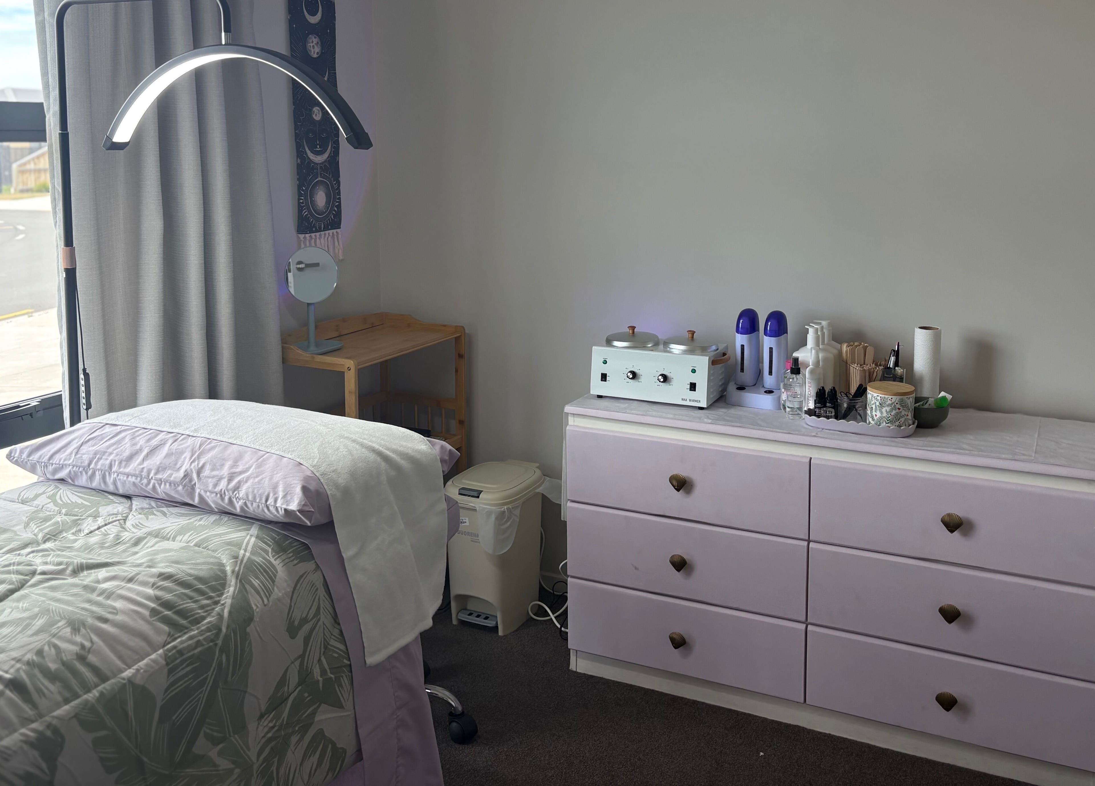 Relaxing therapy room at Glow Therapy - Beauty by Teresa, Woodend, Canterbury Region, NZ. Calm ambiance and cozy setup.