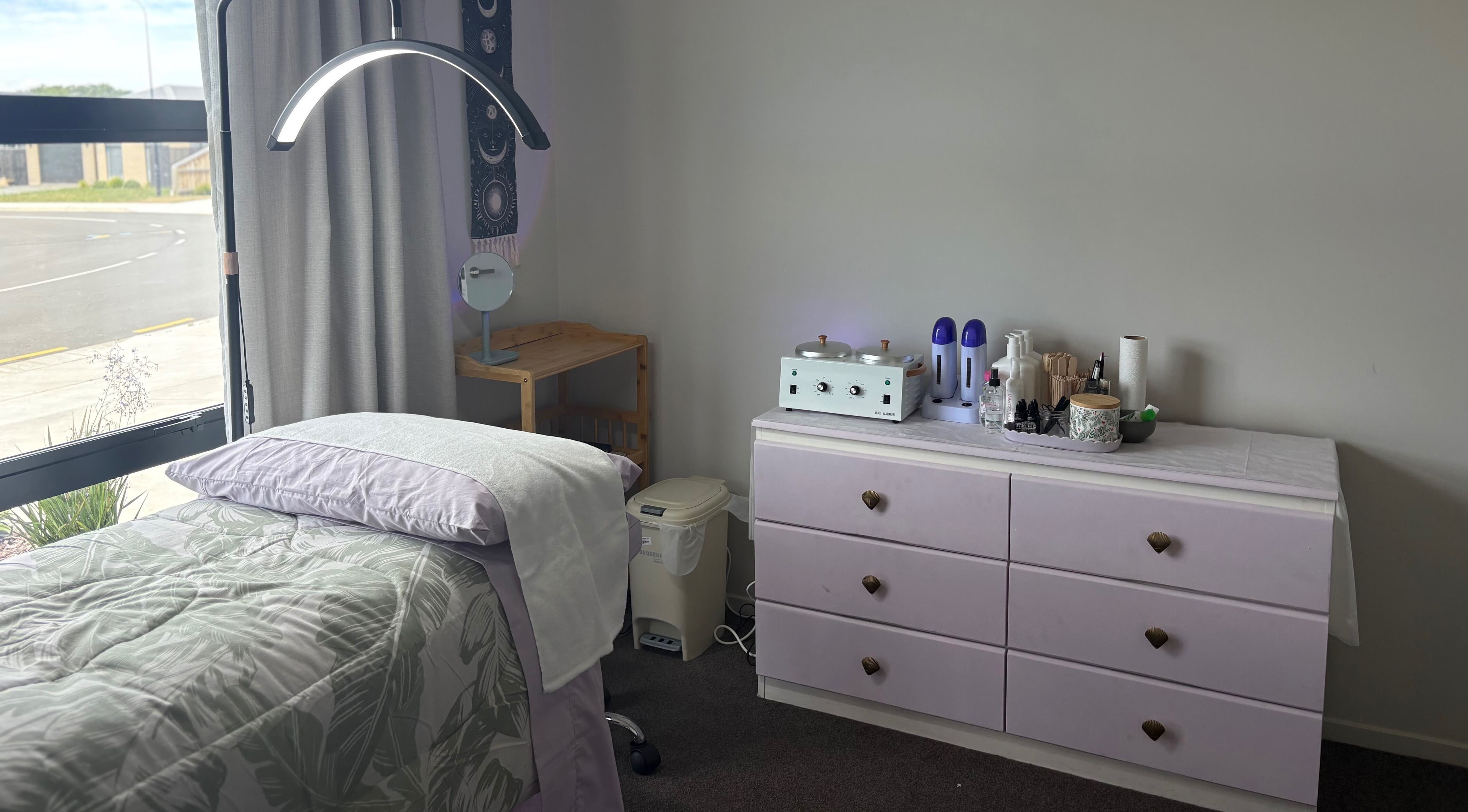 Relaxing therapy room at Glow Therapy - Beauty by Teresa, Woodend, Canterbury Region, NZ. Calm ambiance and cozy setup.