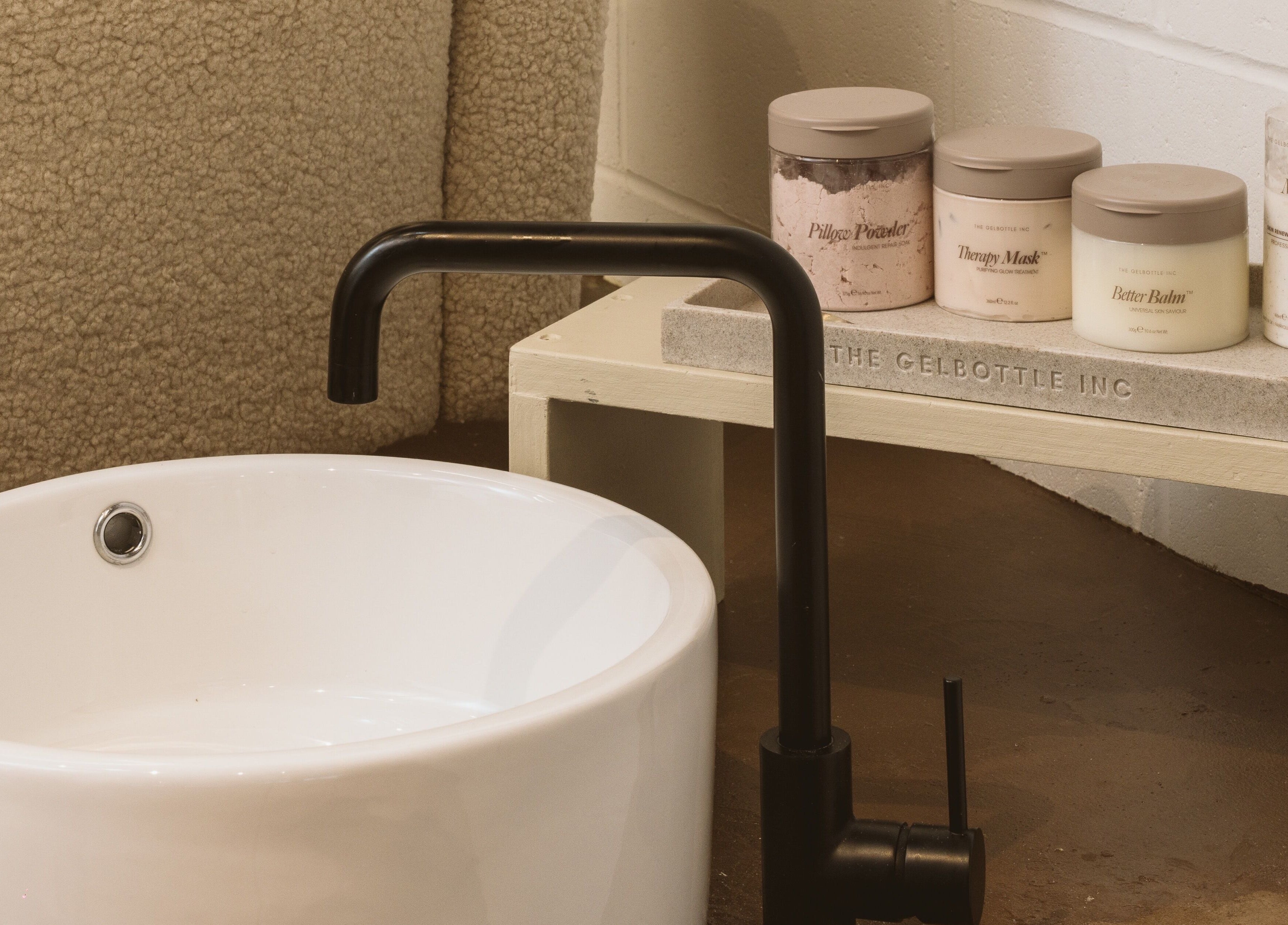 Elegant spa basin and products at Awe London Canary Wharf, London, England, GB, enhancing a serene experience.