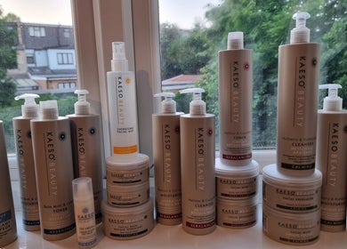 Kaeso Beauty products on display at Aura Spa Studio (home), London, England, GB, showcasing skincare range.