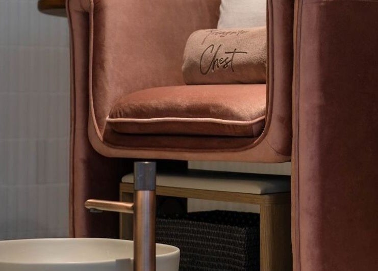 Luxurious velvet pedicure chair at Treasure Chest Nail Salon, Hong Kong Island, HK, invites relaxation.