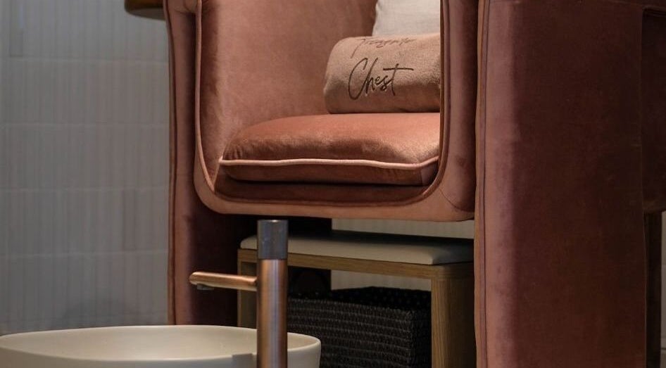 Luxurious velvet pedicure chair at Treasure Chest Nail Salon, Hong Kong Island, HK, invites relaxation.