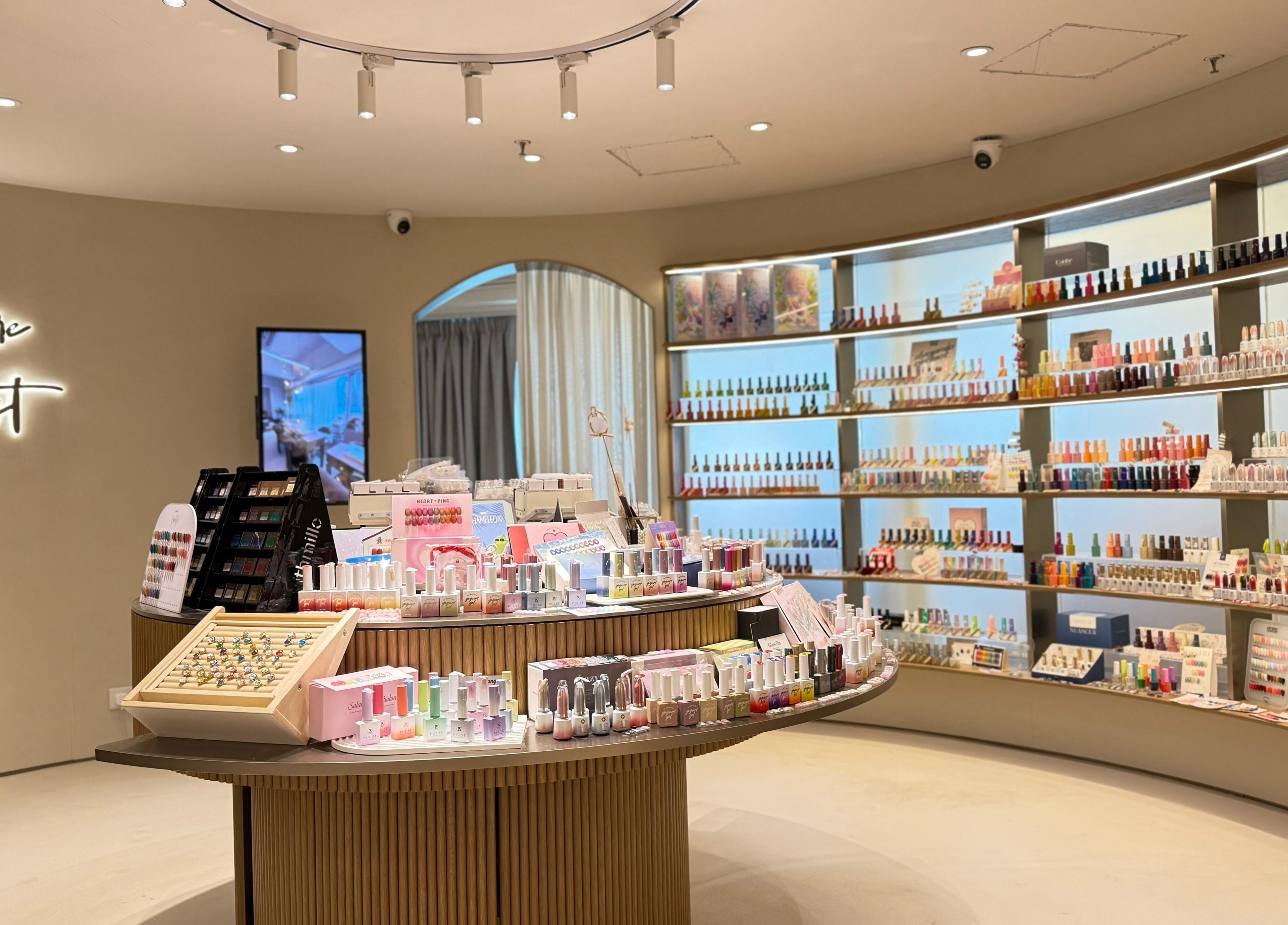 Elegant nail polish display at Treasure Chest Nail Salon, Hong Kong Island, featuring a wide color selection.