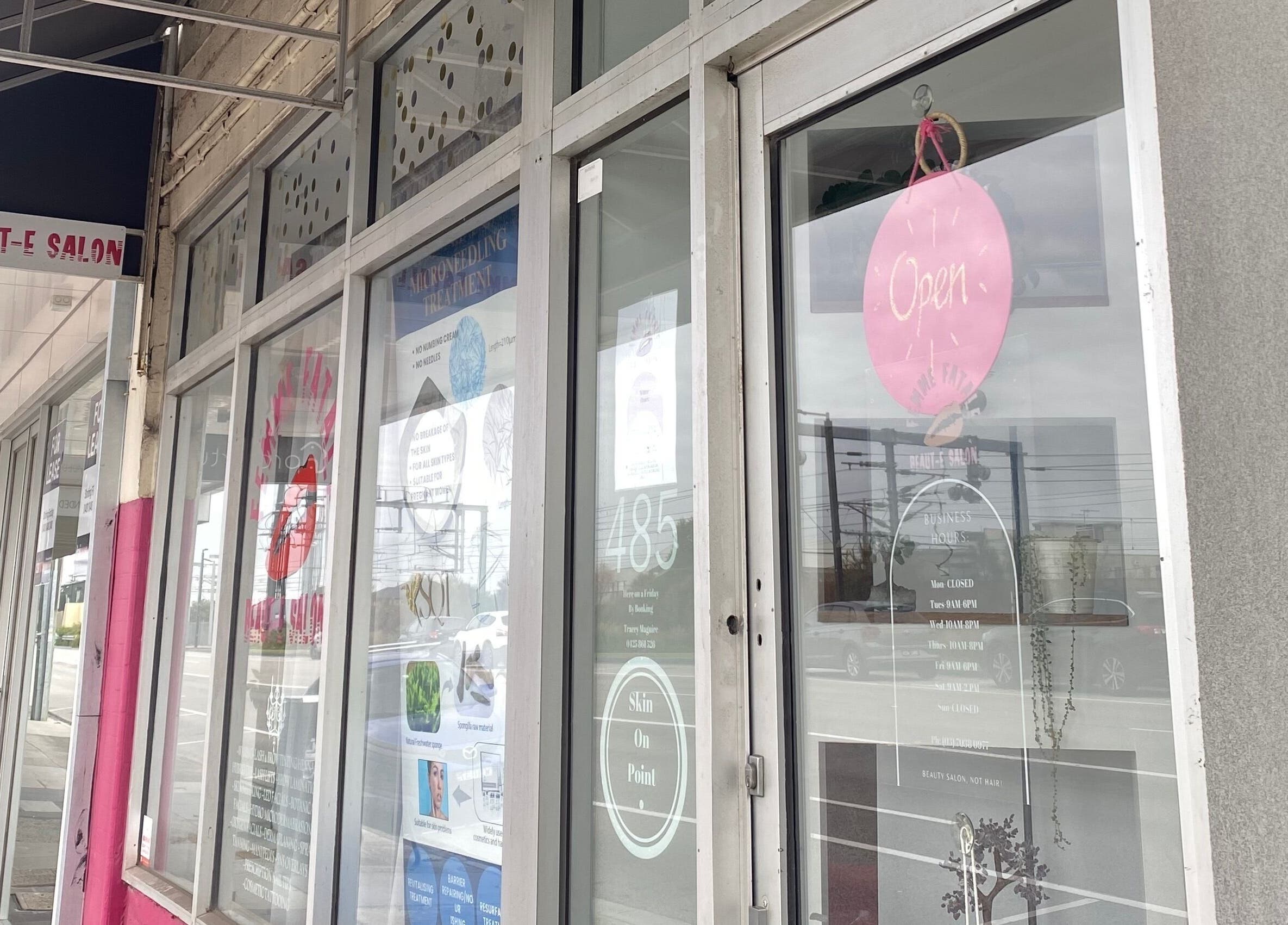 Exterior view of Nails by Mia Sara in Melbourne, Victoria, AU with pink open sign and welcoming storefront.