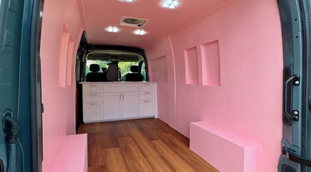 Inside view of The Mobile Lash and Brow Studio van with pink interior, Engadine, New South Wales, AU.