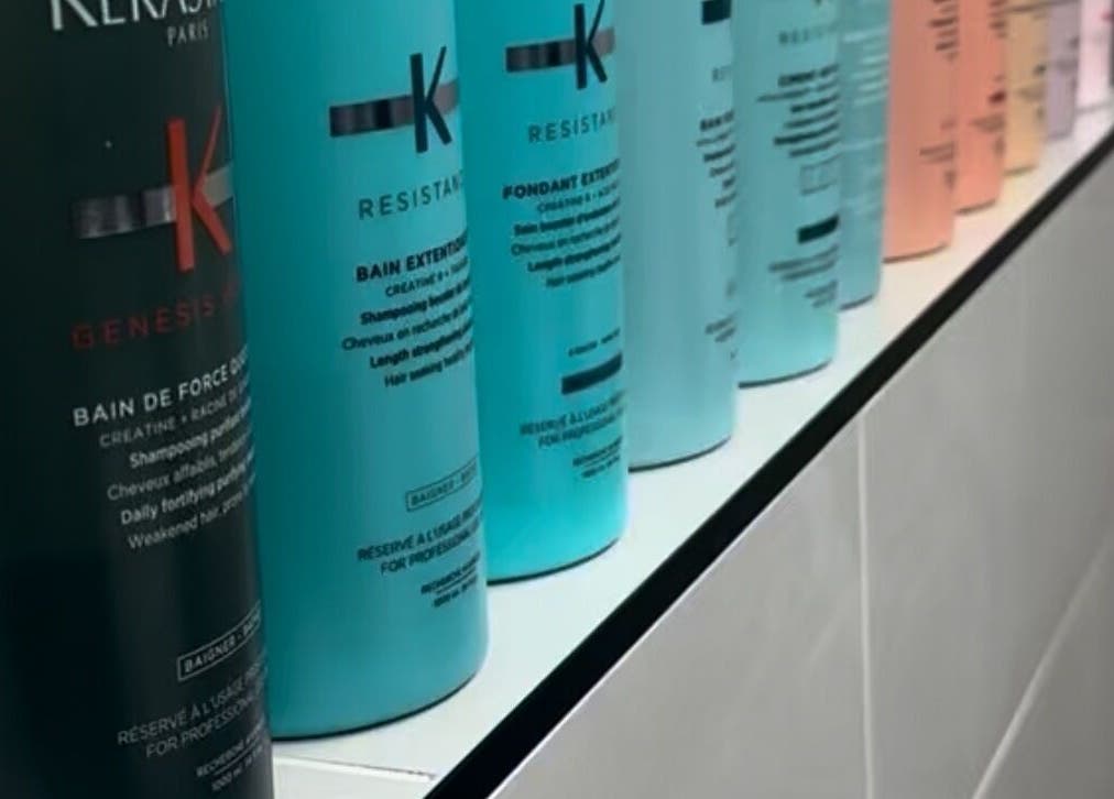A vibrant array of shampoo bottles at James Fulton Hair, Newcastle upon Tyne, England, GB.