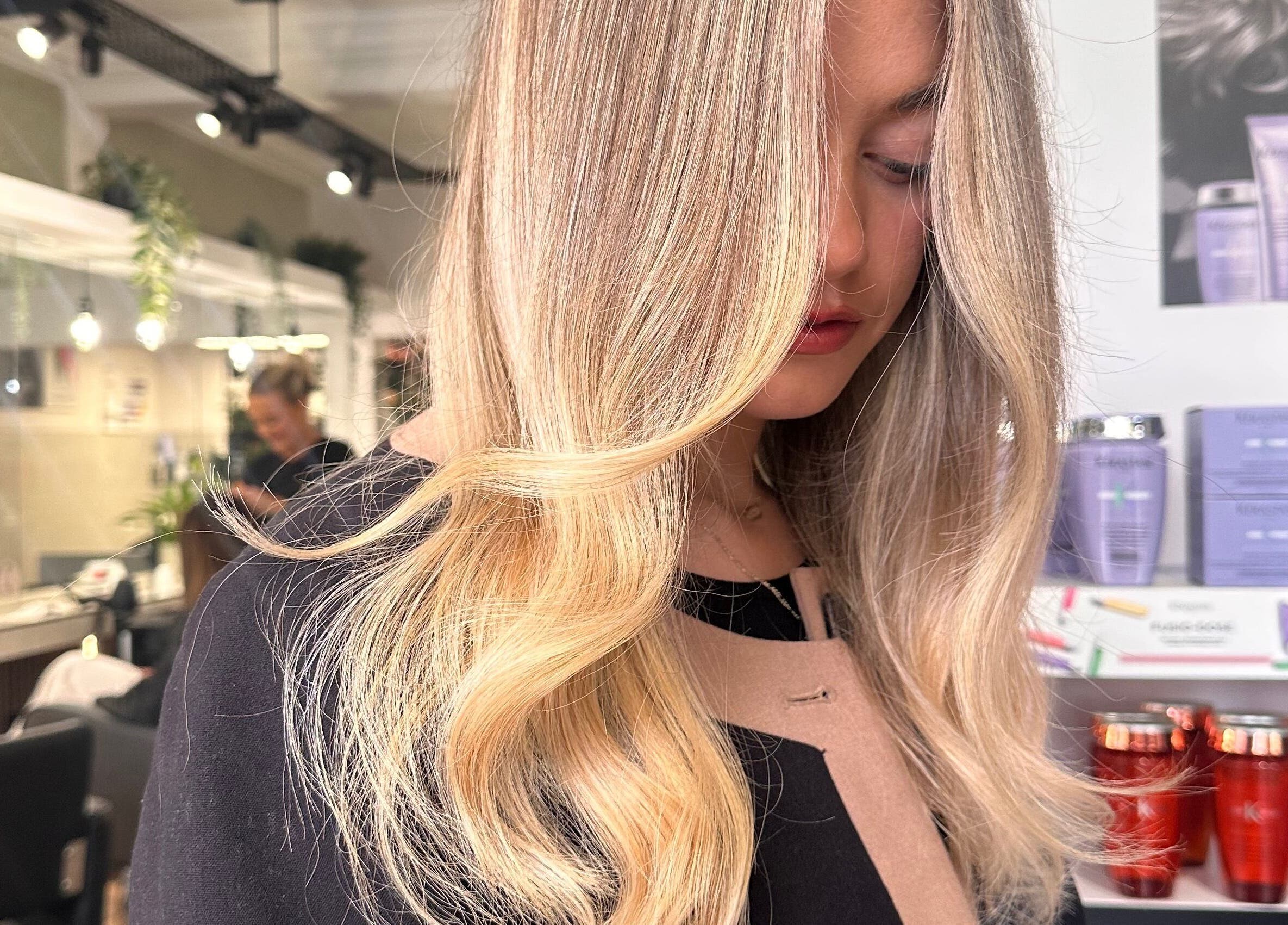 Blonde hair styled beautifully at James Fulton Hair, Newcastle upon Tyne, England, GB salon interior.