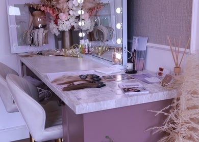 Elegant beauty station at Haus of Belle, Waddesdon, England with chic decor and lighting.