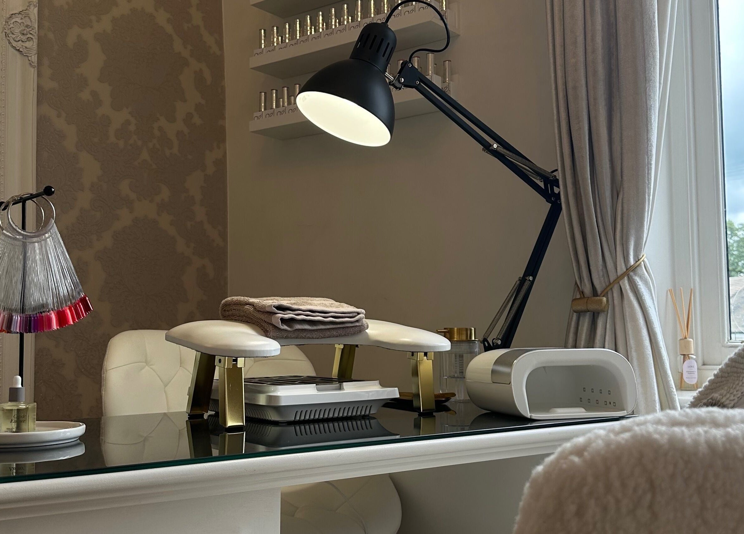 Nail treatment setup at The Essence Of Beauty in Chatburn, England, GB, showcasing modern and cozy decor.
