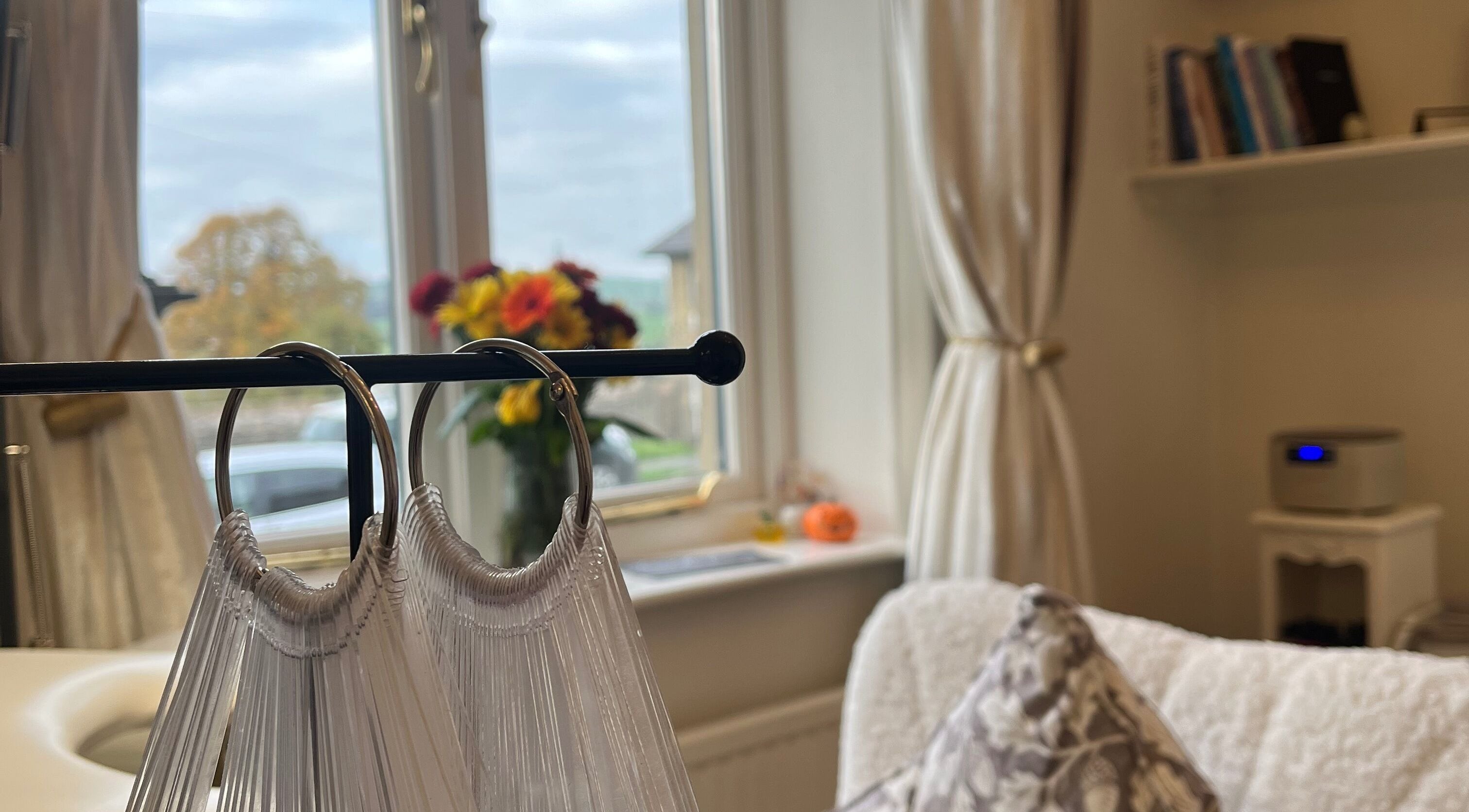 Inviting beauty room at The Essence Of Beauty, Chatburn, England, cozy decor and natural light.