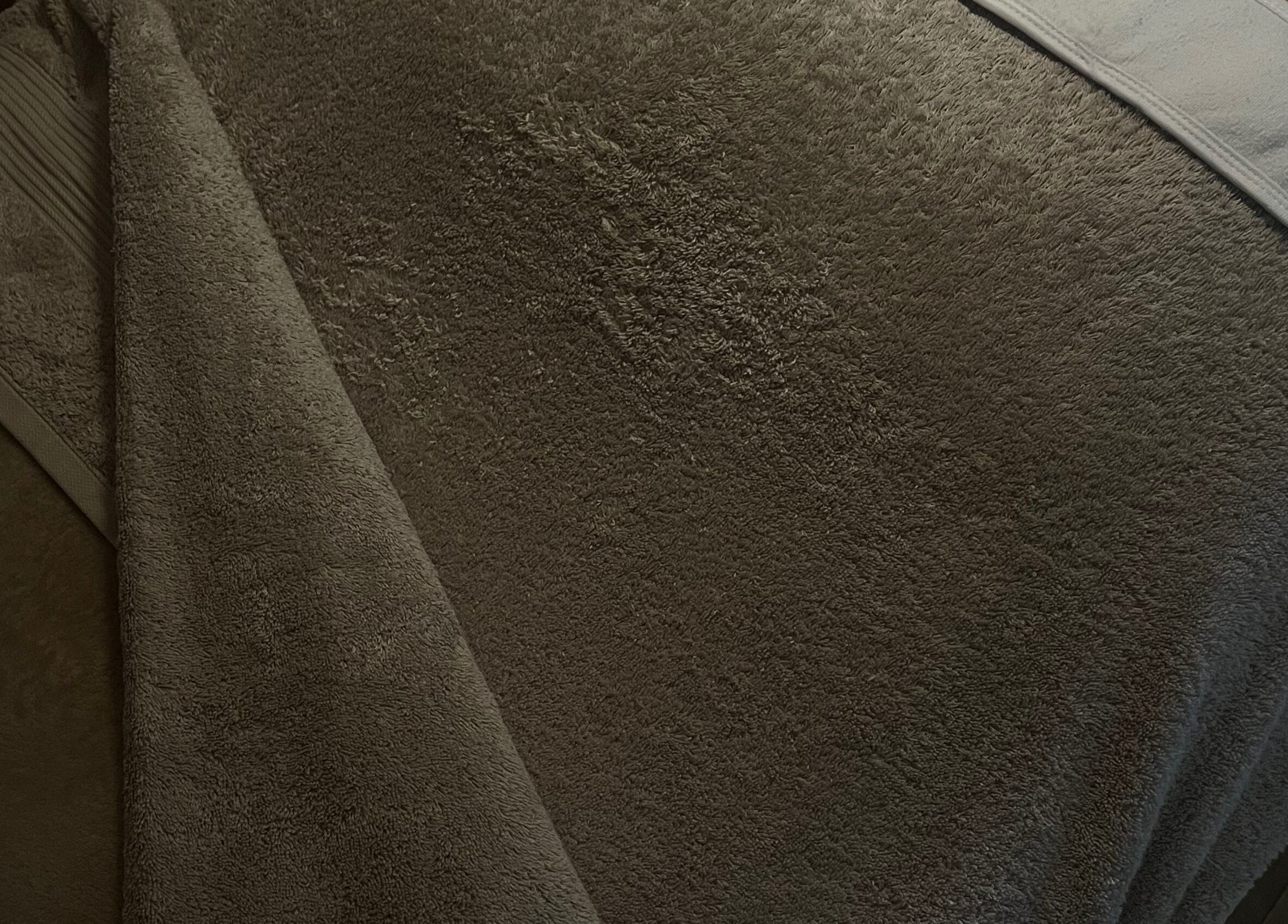 Luxurious spa towels at The Essence Of Beauty in Chatburn, England, GB, ready for a relaxing treatment.