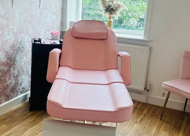 Luxury pink treatment chair at Aesthetics with Nicole, Nelson, England, GB, in a serene and elegant setting.