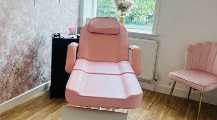Luxury pink treatment chair at Aesthetics with Nicole, Nelson, England, GB, in a serene and elegant setting.