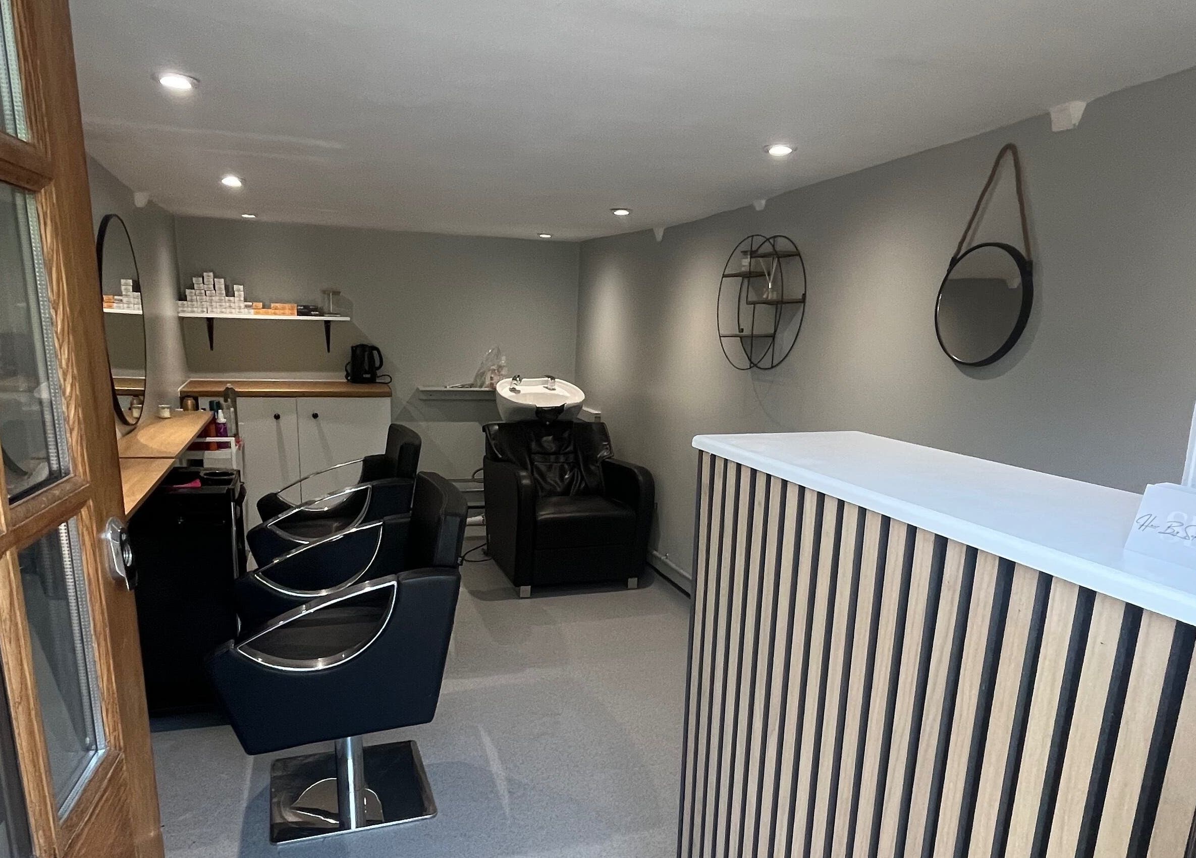 Chic salon interior at Hair By Sophie Leah, Fifield, England, GB offers a welcoming and modern space for clients.