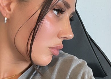 Close-up of a woman's glowing profile at Milèro Aesthetics, Sheffield, England, GB.