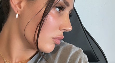 Close-up of a woman's glowing profile at Milèro Aesthetics, Sheffield, England, GB.