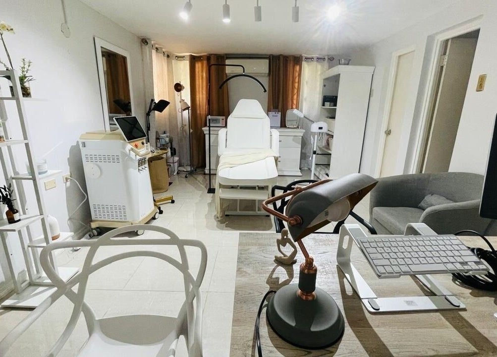 Dr. Trishany Adams spa interior in Kingston, St. Andrew Parish, JM with treatment chair and modern decor.