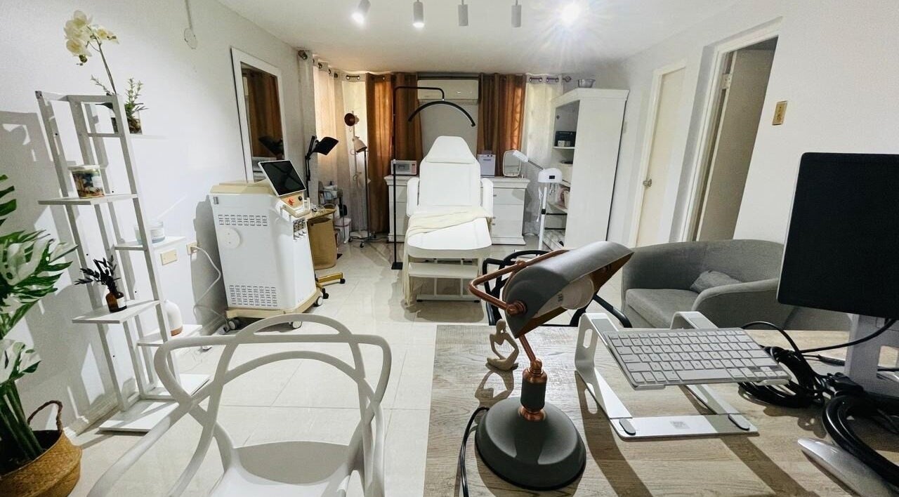 Dr. Trishany Adams spa interior in Kingston, St. Andrew Parish, JM with treatment chair and modern decor.