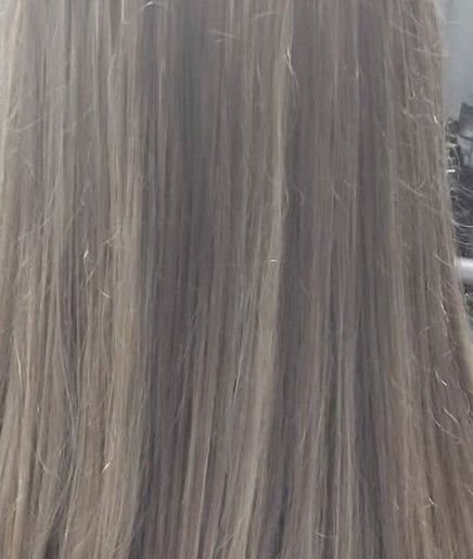 Smooth, straight hair styled at Emma Hair, located in Liverpool, England, GB.