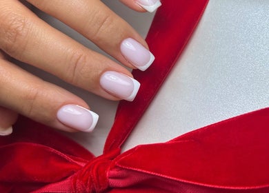 Beautiful French manicure at Nails by Ilona, Chicago, United States, US, featuring elegant red accents.