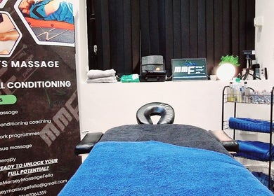 Inviting massage room at DŌMN THERAPY, Liverpool, England, GB, featuring soothing decor and relaxing atmosphere.