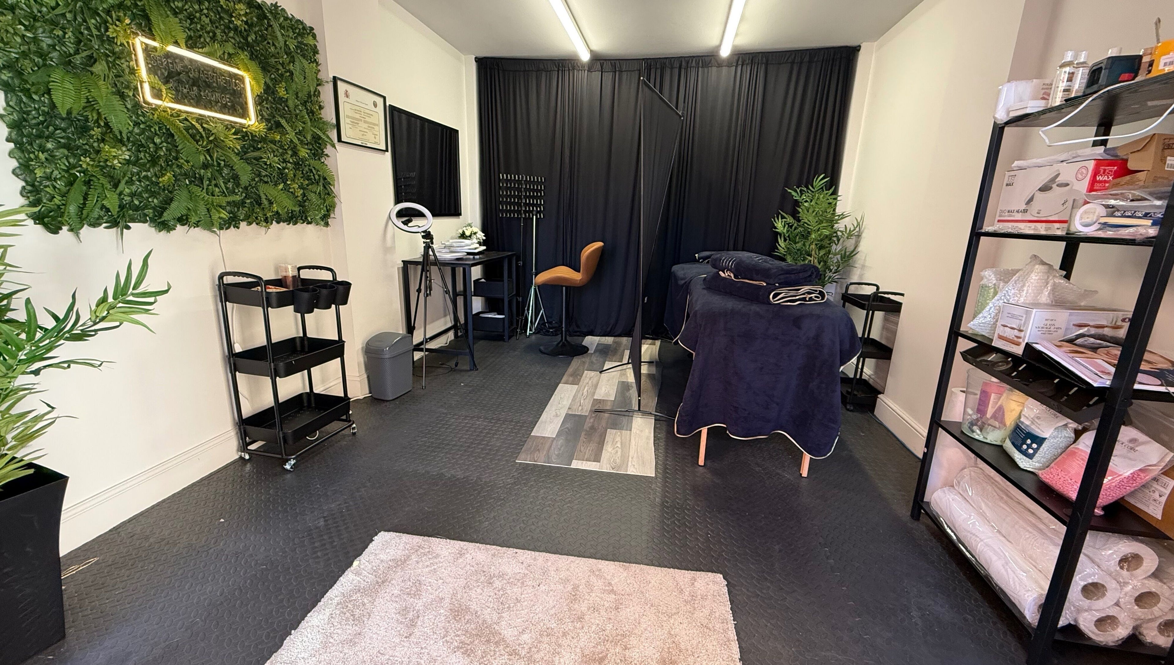 Interior of Serene S. Esthetics & Hair Lounge in Newport, Wales, GB, featuring styling and spa equipment.