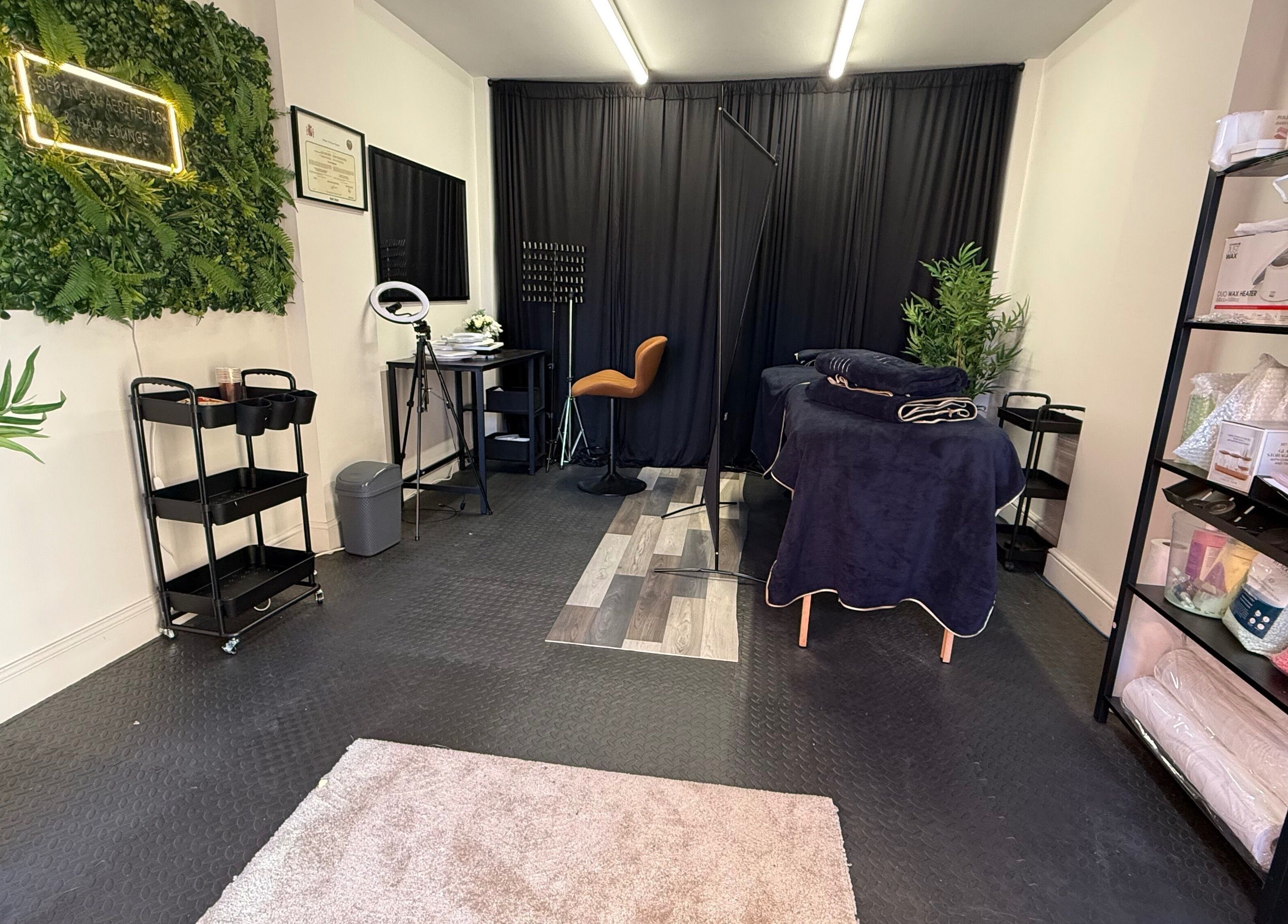 Interior of Serene S. Esthetics & Hair Lounge in Newport, Wales, GB, featuring styling and spa equipment.