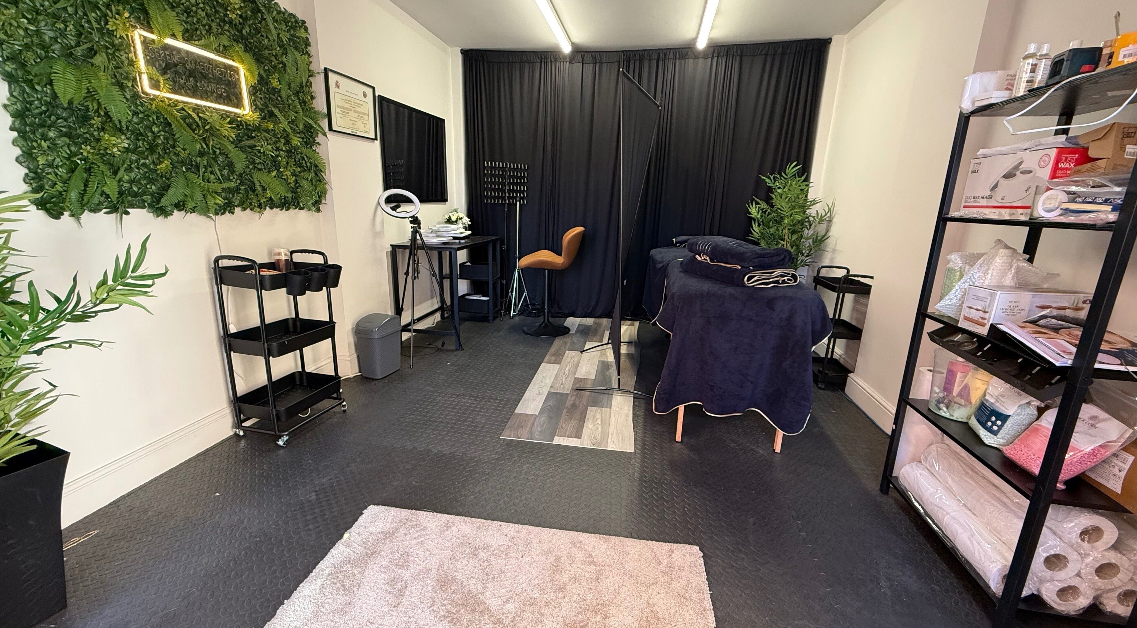 Interior of Serene S. Esthetics & Hair Lounge in Newport, Wales, GB, featuring styling and spa equipment.