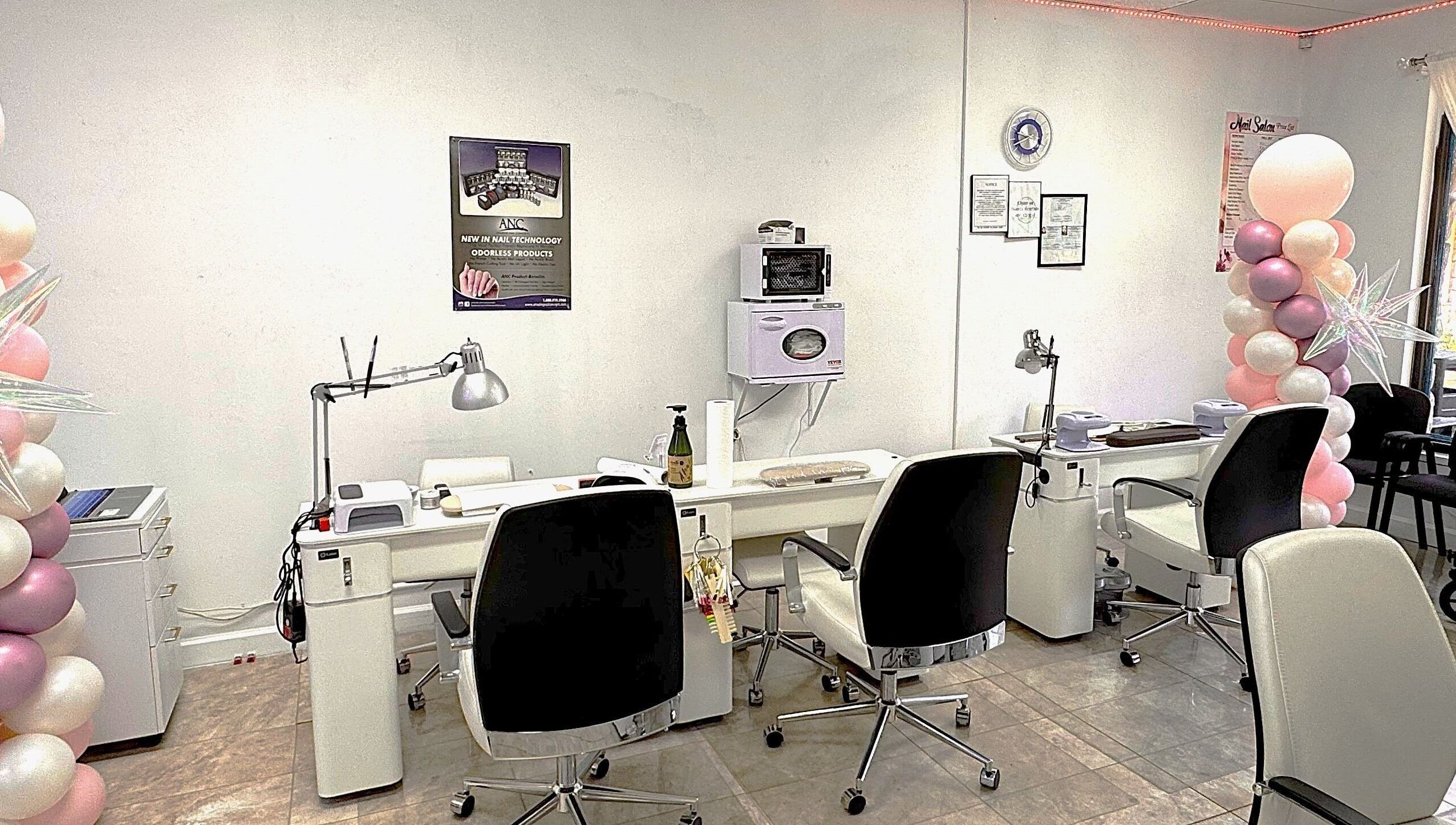 Bright, modern nail station at New Tek Nails in Manchester Township, New Jersey, US, with stylish decor.