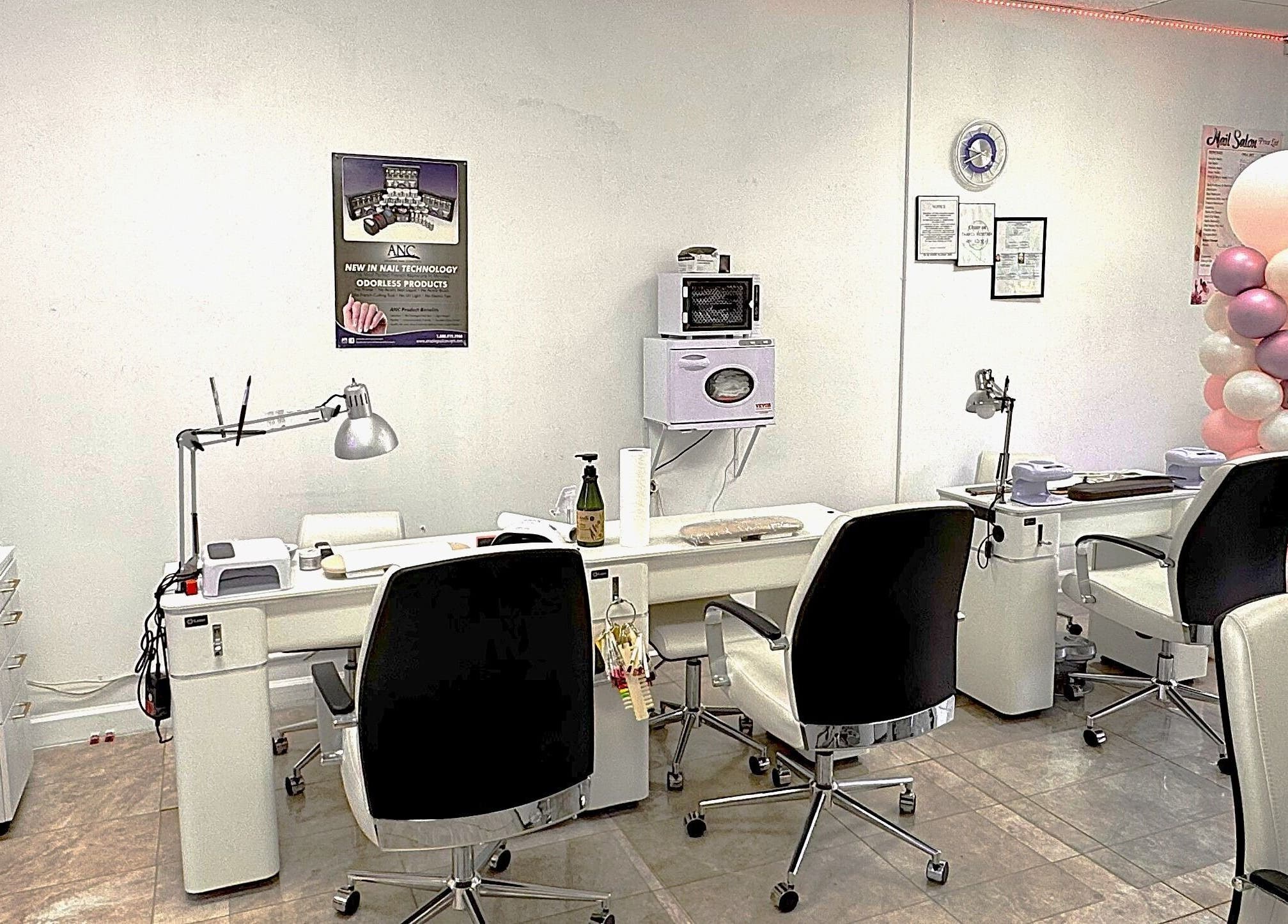 Bright, modern nail station at New Tek Nails in Manchester Township, New Jersey, US, with stylish decor.