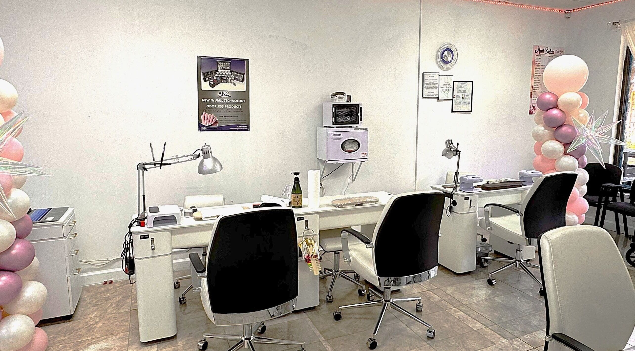 Bright, modern nail station at New Tek Nails in Manchester Township, New Jersey, US, with stylish decor.