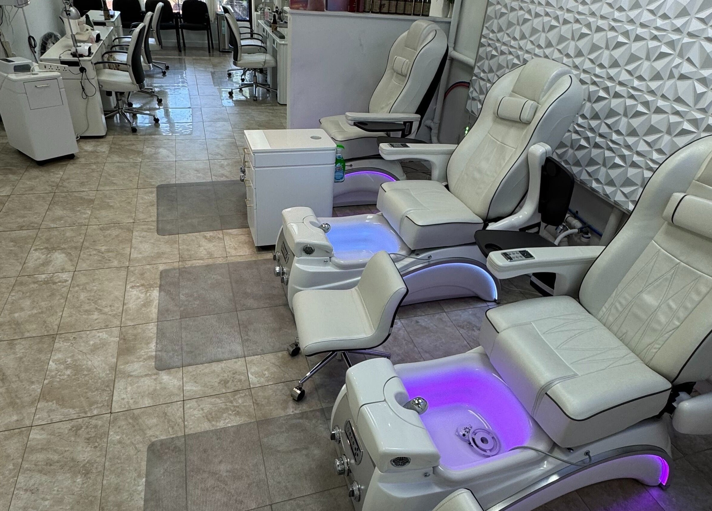 Luxurious spa chairs at New Tek Nails in Manchester Township, New Jersey, US, ready for a relaxing experience.
