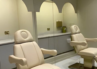 Relaxing treatment room with plush chairs at Clinic E, Clarkston, Scotland, GB.