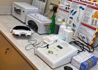 Sterile equipment on a counter at Clinic E, Clarkston, Scotland, GB, showcasing hygiene and safety standards.