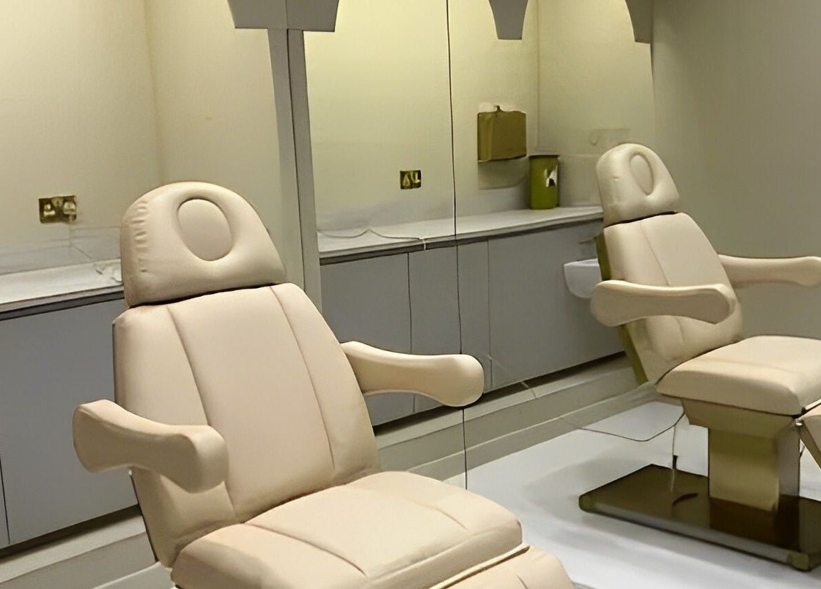 Luxury treatment chairs in Clinic E, Clarkston, Scotland, GB, offering a serene wellness atmosphere.