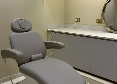 Comfortable treatment chair at Clinic E in Clarkston, Scotland, GB, ideal for wellness and beauty services.