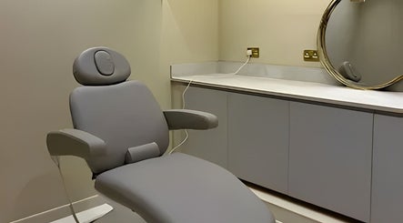 Comfortable treatment chair at Clinic E in Clarkston, Scotland, GB, ideal for wellness and beauty services.