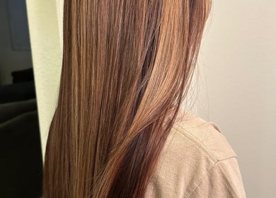 Smooth, silky straight hair styled at Hevani Touch, US, showcasing expert hair care.