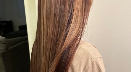 Smooth, silky straight hair styled at Hevani Touch, US, showcasing expert hair care.