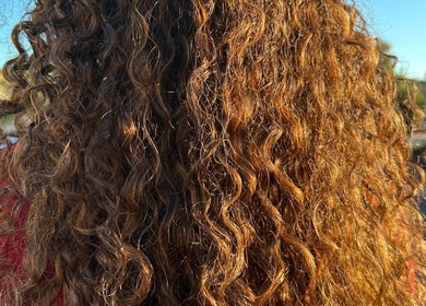 Close-up of sunlit curly hair styled at Hevani Touch, Riverside, California, US.