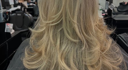 Blonde wavy hairstyle service at Hevani Touch, Riverside, California, US showcasing luxurious salon results.