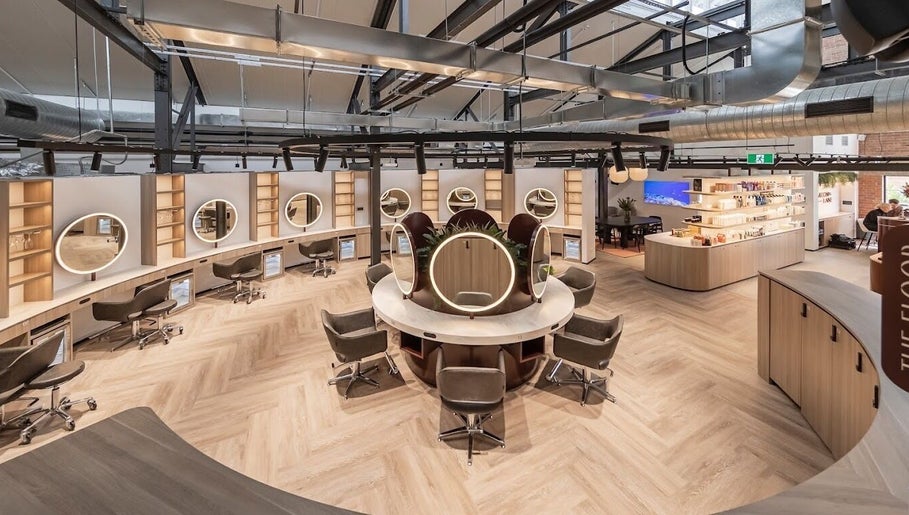 Spacious interior of Koco Hair by Jessicka- Salon Lane West End in West End, Queensland, AU with chic styling stations.