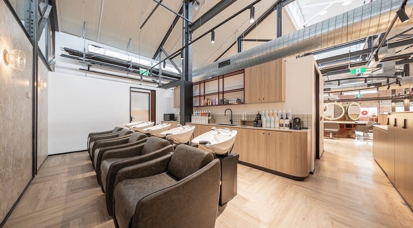 Modern interior of Koco Hair by Jessicka- Salon Lane West End in West End, Queensland, AU with stylish wash stations.