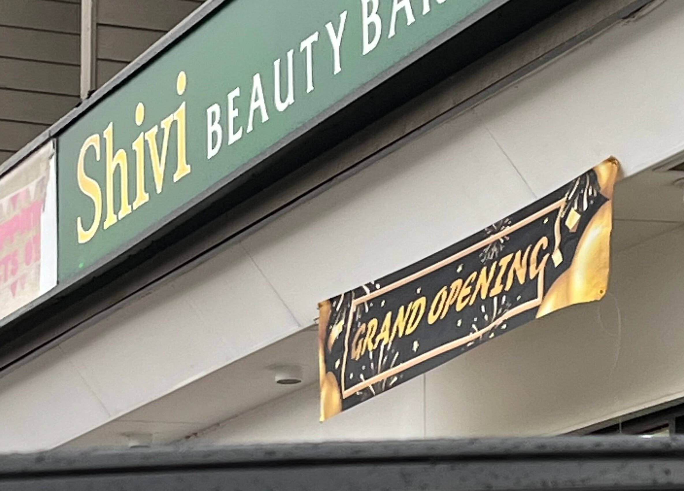 Grand opening banner at Sungho Hair Salon, Coquitlam, British Columbia, CA, showcasing vibrant celebration.