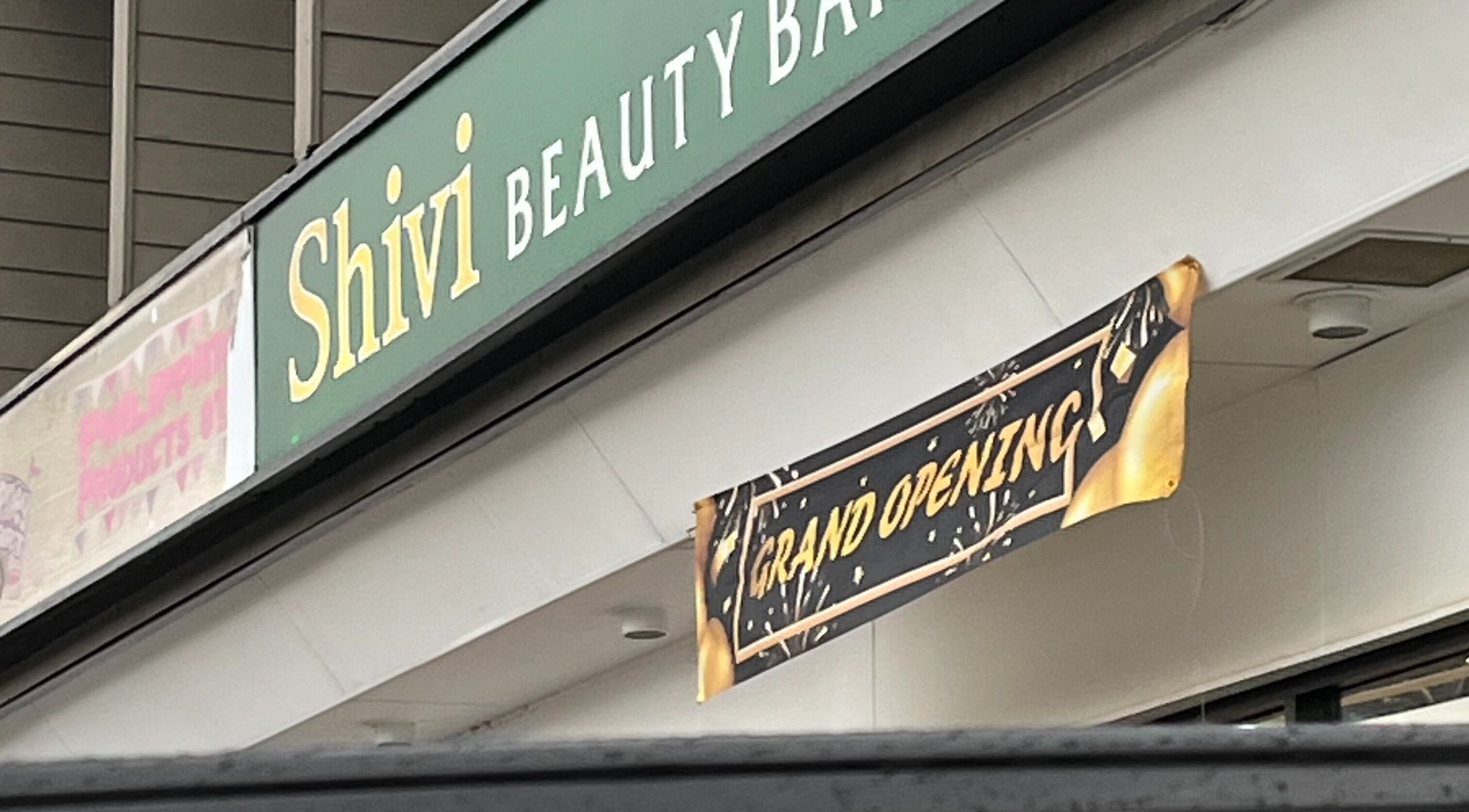 Grand opening banner at Sungho Hair Salon, Coquitlam, British Columbia, CA, showcasing vibrant celebration.