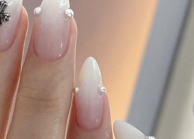 Artistic nail design with embellishments at Nailspa, Singapore, SG.