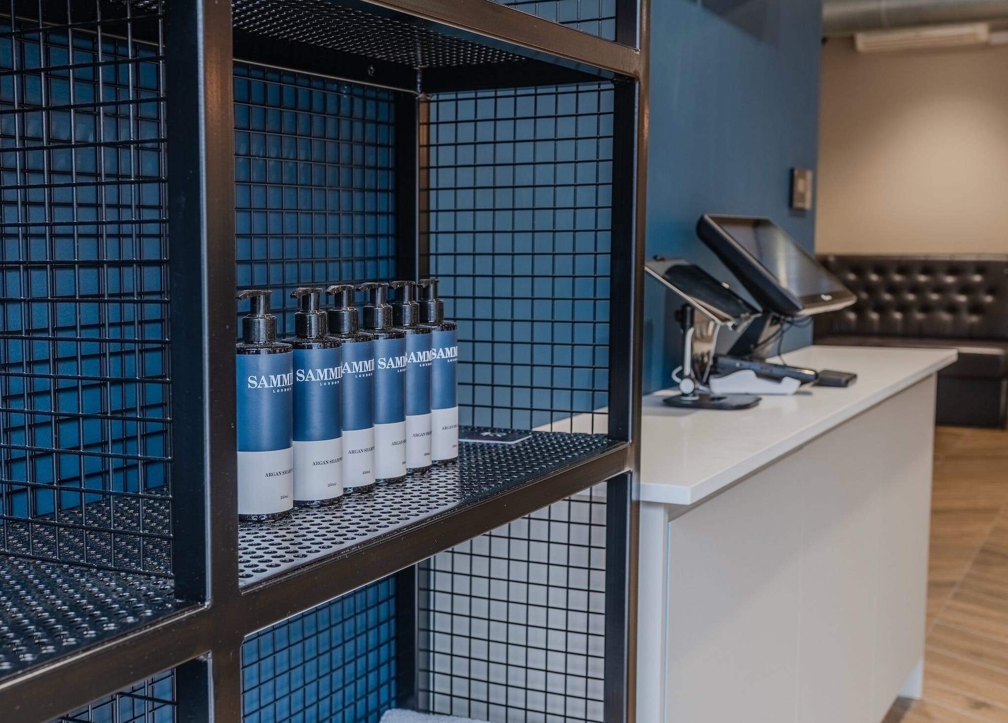 Sammies Studio - Banstead reception area with stylish shelves and products in Banstead, England, GB.