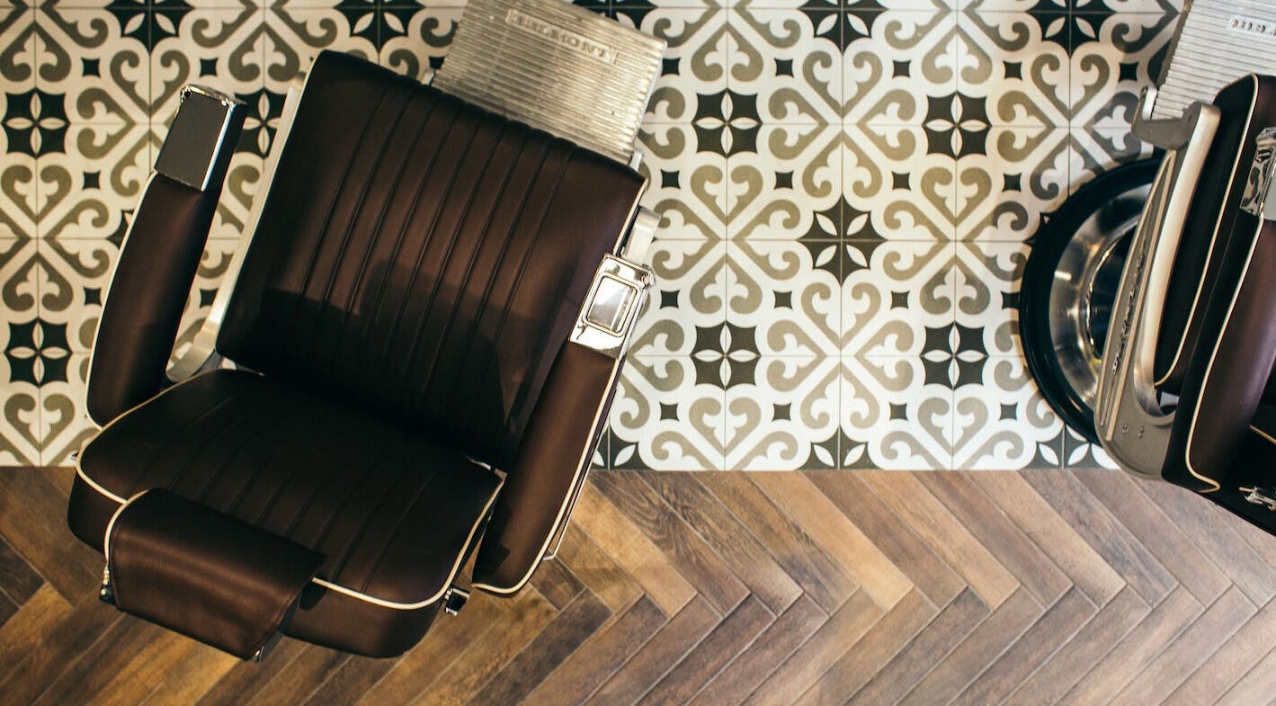 Elegant salon chair at Sammies Studio - Fulham Road, London, England, GB with stylish tiled floor.